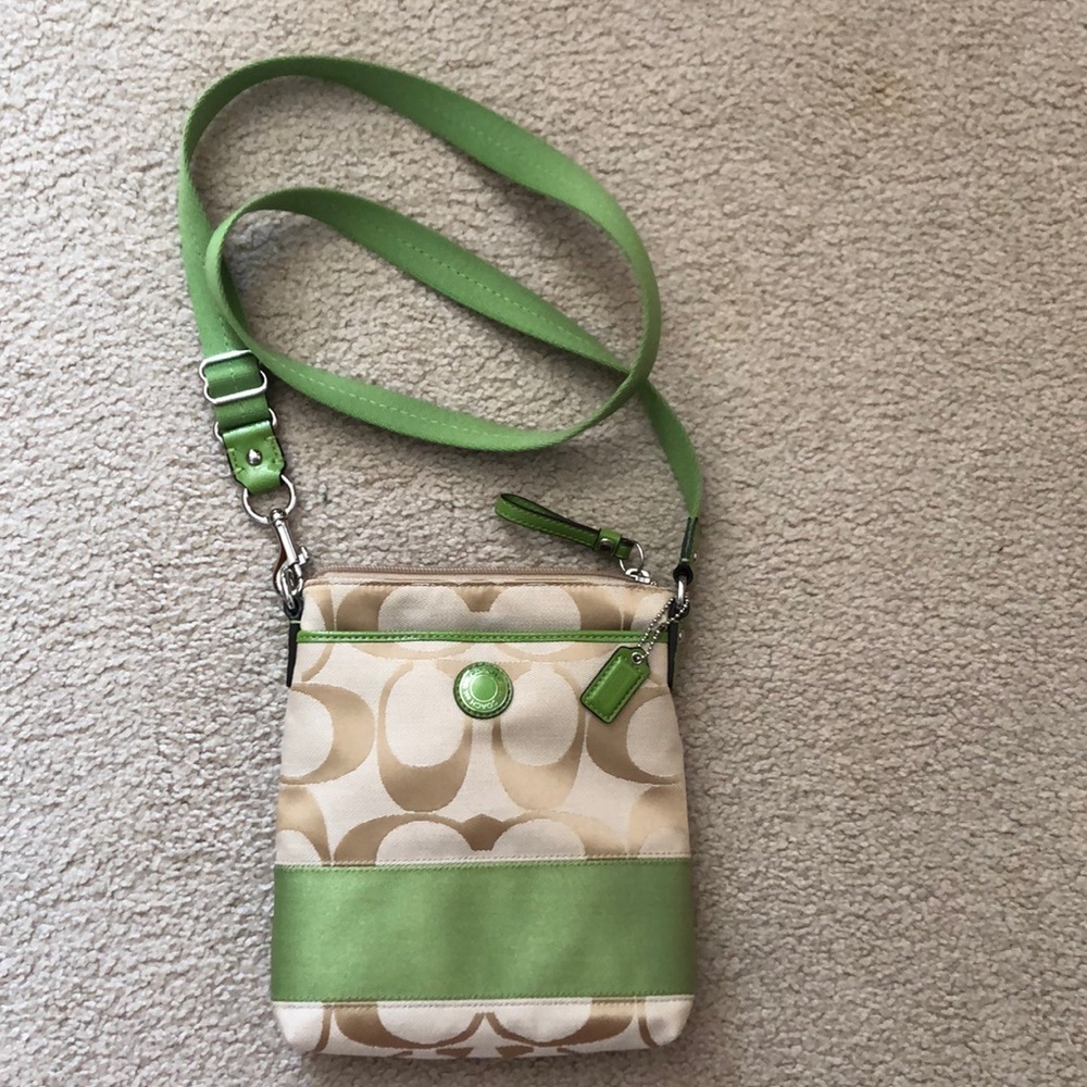 Coach crossbody purse with green detailing